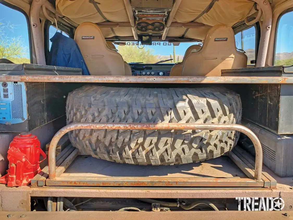 40-inch spare fits easily behind the passengers in back